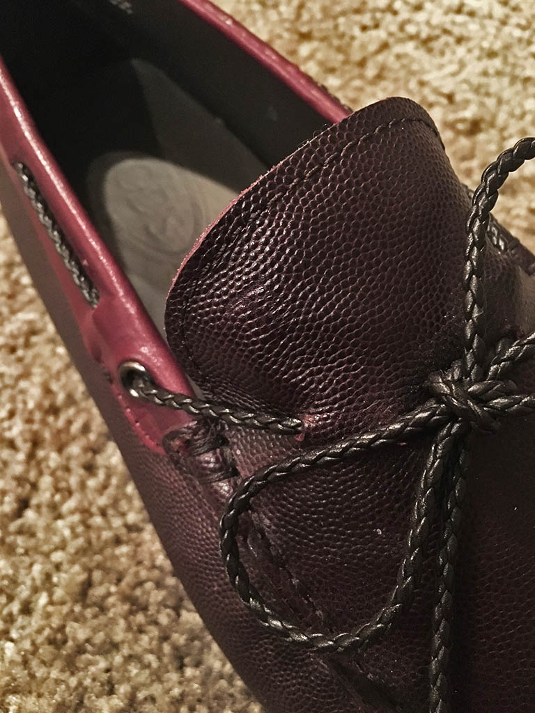 Leather laces of the burgundy Tod's Driving Shoes, an iconic Italian shoe