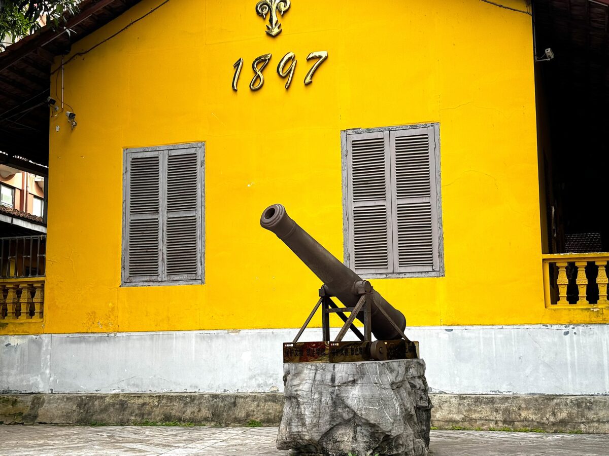 Hekou Customs Building with an old cannon in front was built alongside the Yunnan-Vietnam Railway, Yunnan's Border City Hekou 