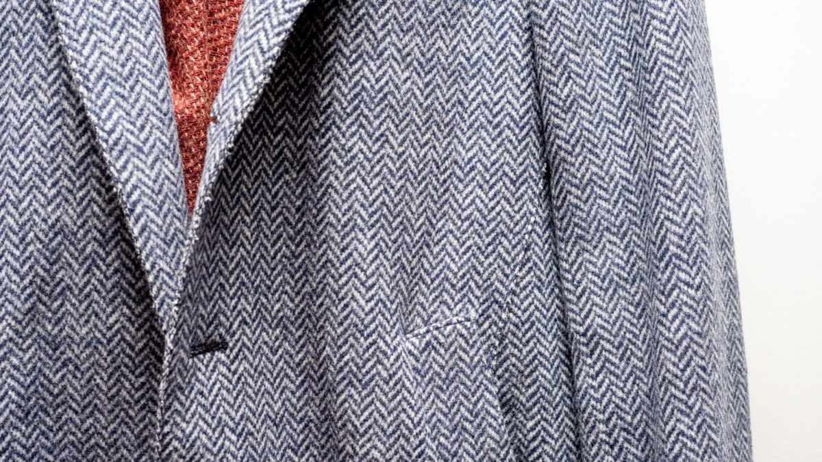 Herringbone pattern blazer, a pattern often seen in men's fashion
