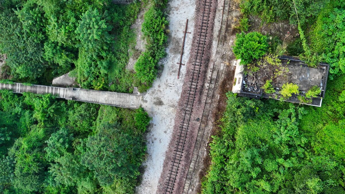 Wooden bridge atop the Nanxi Bridge and leading into Lahadi Train Station in Pingbian County