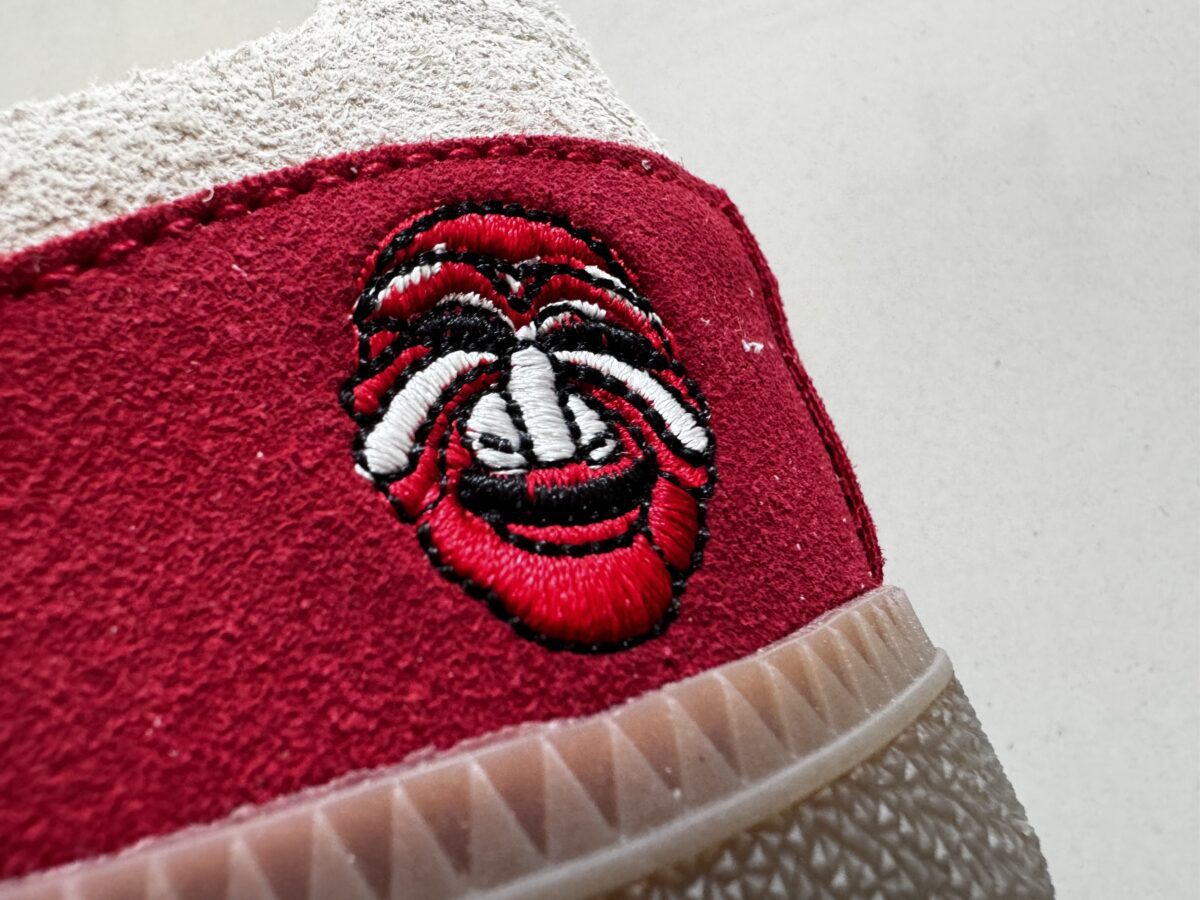 A closer look at the heel of the Adidas samba which has a Talchaum Korean mask embroidered on