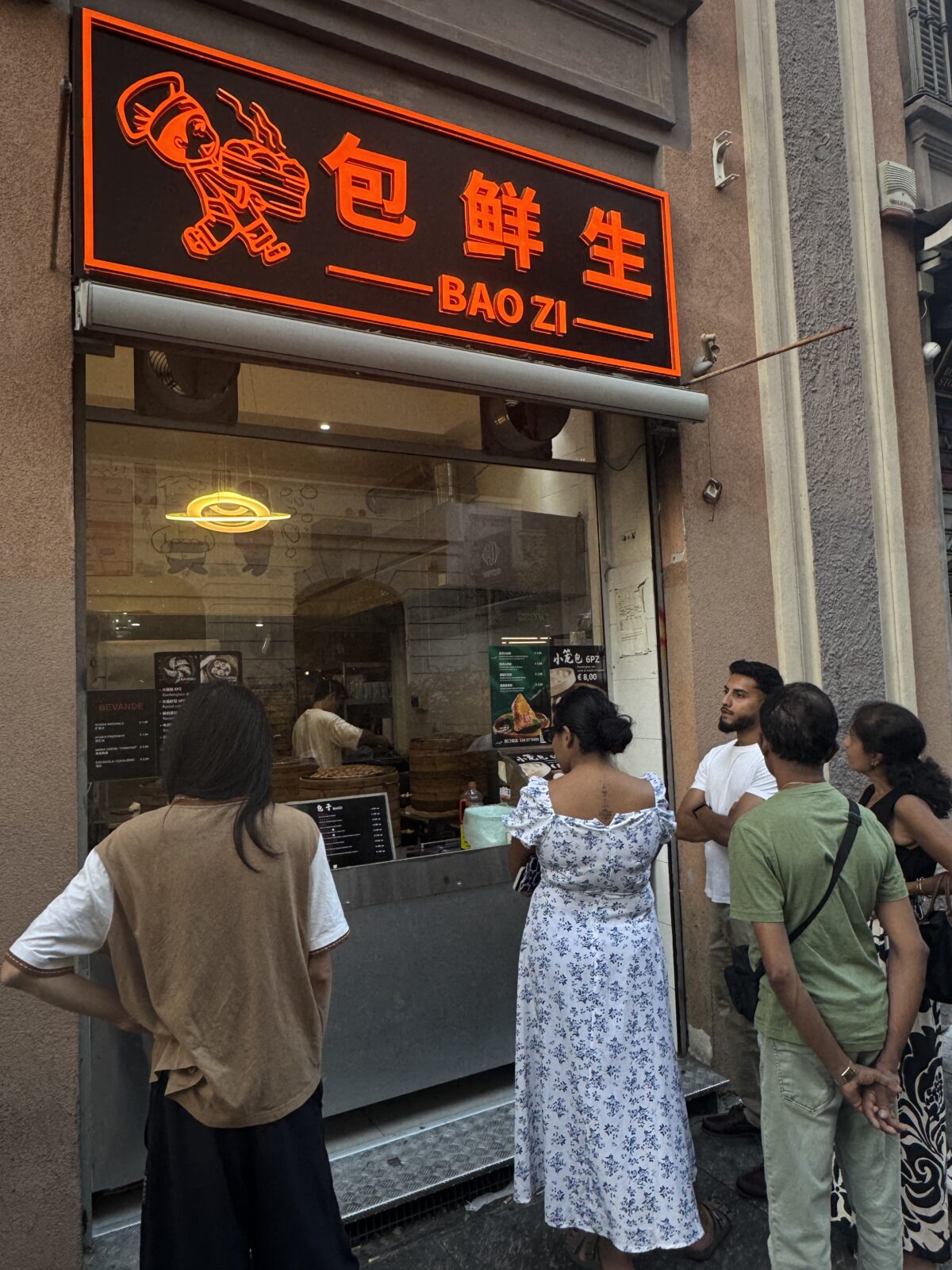 Mr. Bao Zia a dumpling shop in Milan's Chinatown attracts crowds of various ethnicities